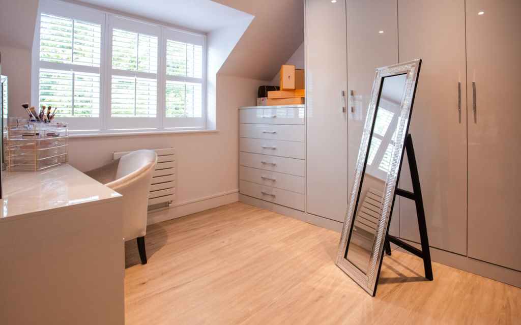 walk in closet with full length mirror