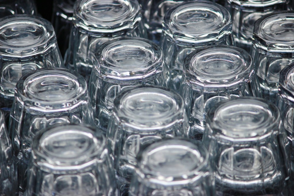 water glasses upside down on rack