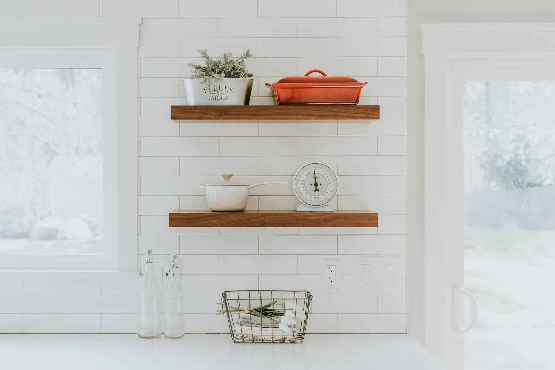 White subway tile backsplash in laundry room