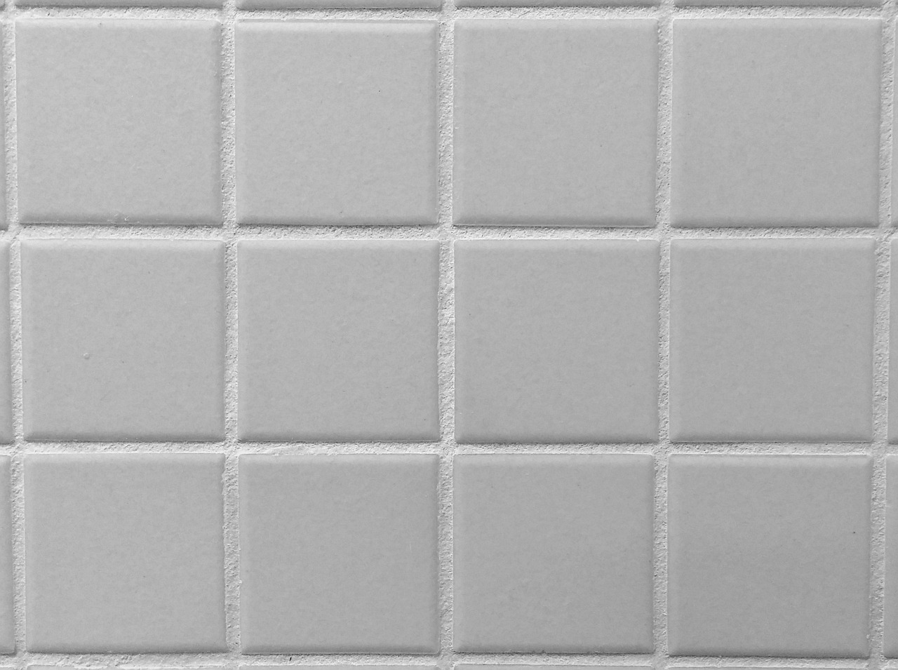 Light gray tiling with grout between