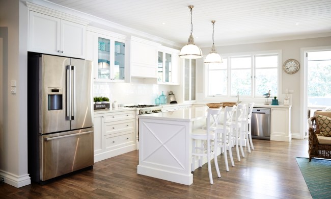 All white kitchen with a beadboard ceiling
