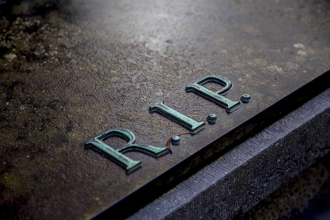 R.I.P. on a marble gravestone