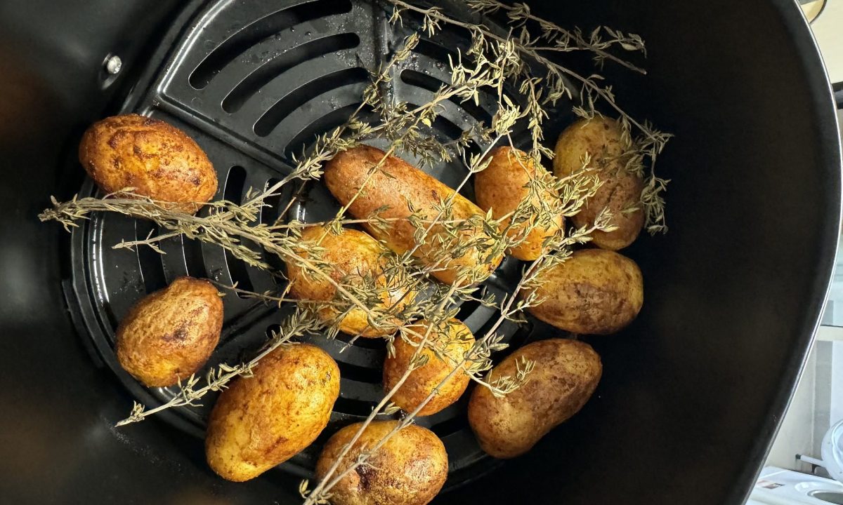 Potatoes and rosemary in an air fryer