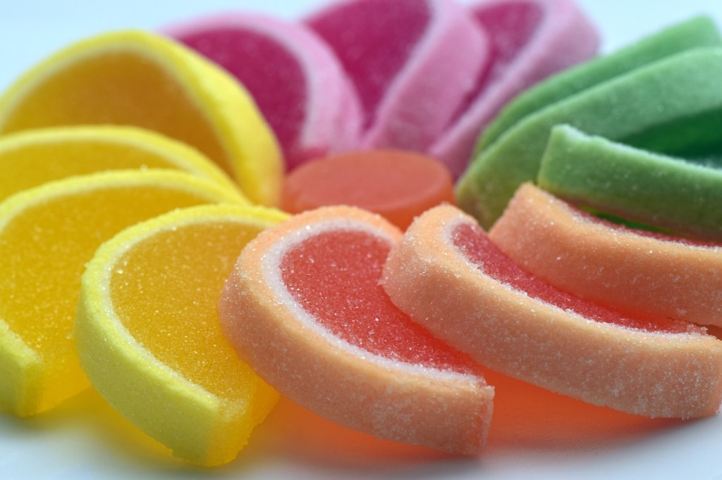 Sugar candy in a wreath on a white surface