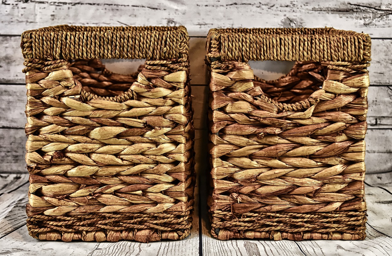 Two wicker baskets with covers