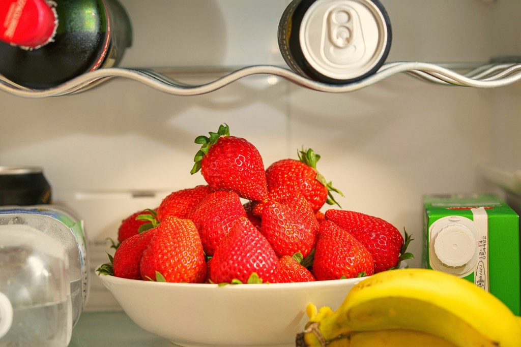 Fruits on shelf in fridge
