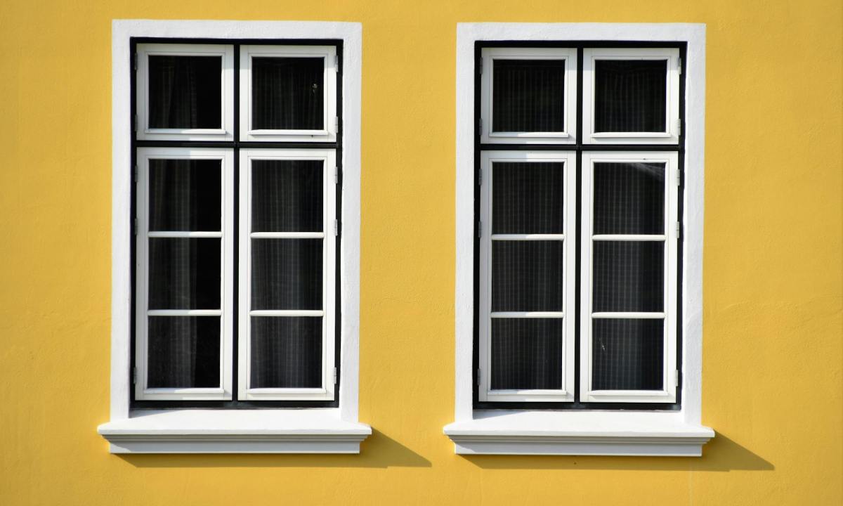 Closed white wooden-framed glass windows