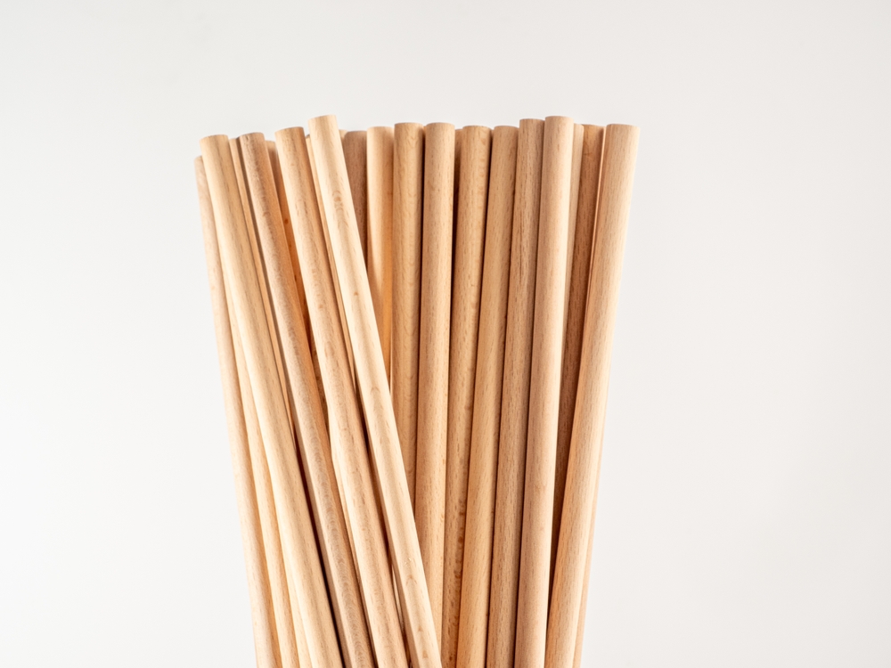 Bunch of long wooden dowels