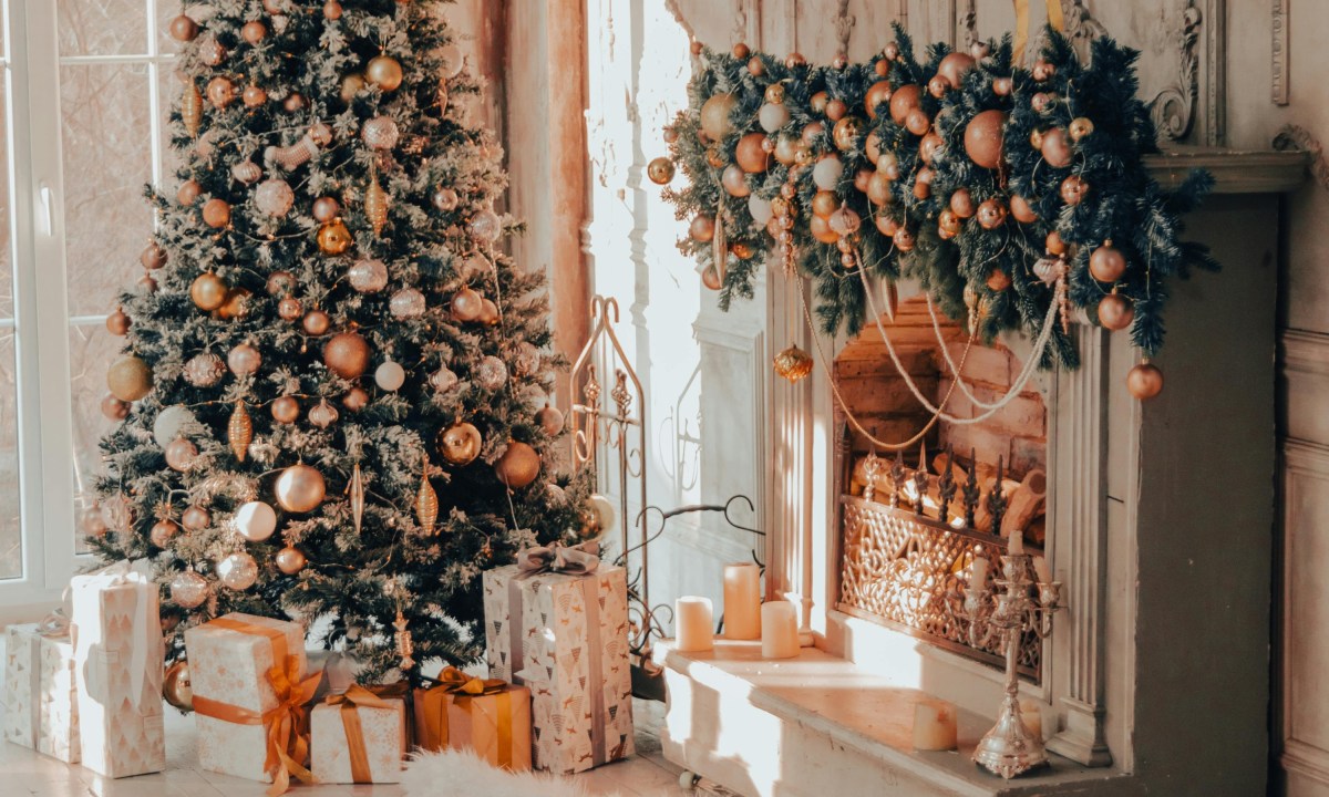 copper and gold christmas tree and fireplace mantle decor