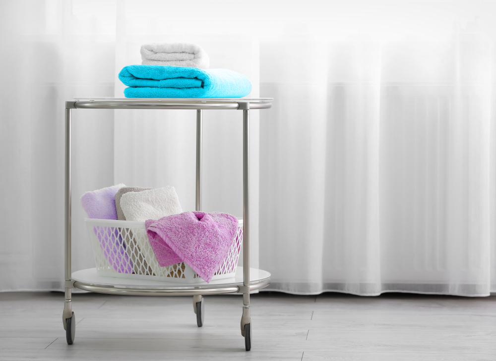 Bathroom storage cart with colorful towels