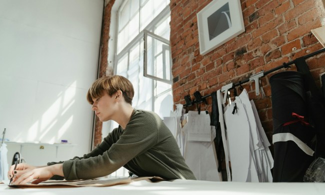 Person in craft room sewing